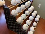 Golf Display Stand - Sleek Rack To Showcase Collectible Balls. Fixed Price $17.00.
