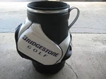 Brand New Bridgestone Golf Den Caddy White / Black Silver. Fixed Price $110.00.