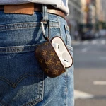 Brown Designer Monogram Protective Earbuds Case For Airpods. Fixed Price $45.00.