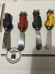Golf Themed Cheese Spreaders Bag Handle Serving Knives Boston Warehouse. Fixed Price $15.00.