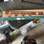 Golf-themed Walnut-finish Tie Rack Brown Gold Wood Metal, Club Ball Accents. Fixed Price $60.00.