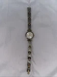 Fossil Watch Women 25MM ES-8953 Silver /golf Tone White Dial Battery 6.5". Fixed Price $20.25.