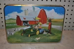 John Deere Golf Balls, Tees, Divot Tool & Collector Tin Set, New. Fixed Price $18.99.