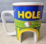 Mugz By Ganz Hole In One Green Yellow Golf Arched Ceramic Coffee Cup 16 Oz. Fixed Price $22.05.