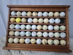 50 Golf Wood Wall Display Rack Includes 49 Balls Cabinet Sports Office. Fixed Price $150.00.
